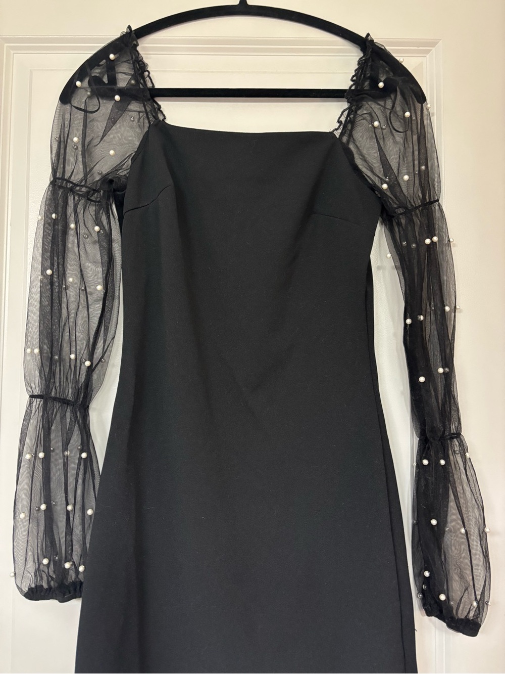 Elegant Black Dress with Sheer Pearl-Embellished Sleeves